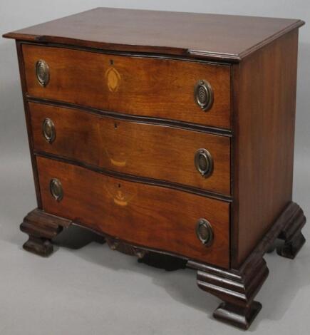 An 18thC style Virginia type mahogany serpentine chest