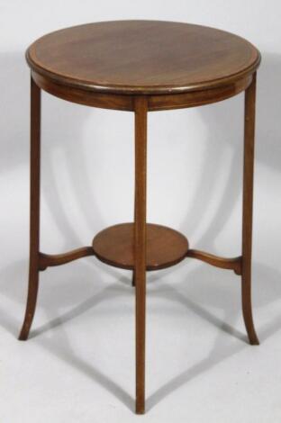 An Edwardian mahogany occasional table