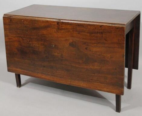 An early 19thC mahogany drop leaf table