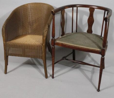 An Edwardian mahogany boxwood strung tub chair