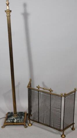 A brass Corinthian column standard lamp