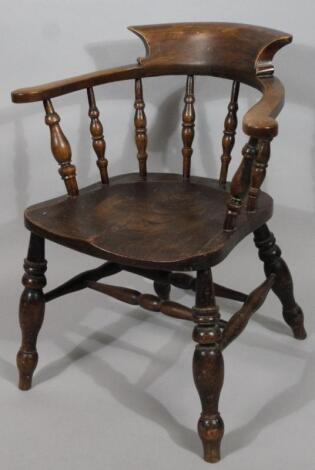 A 19thC ash and elm captain's chair