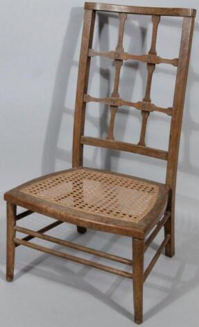 An unusual early 20thC Arts and Crafts side chair