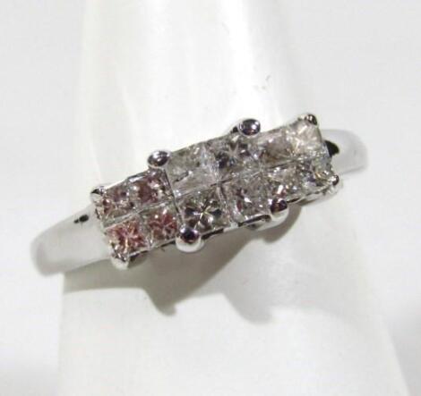 A ladies Princess cut diamond pave ring