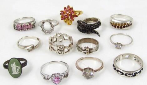 Thirteen various assorted rings