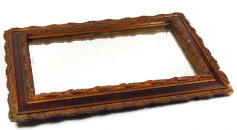 An 18thC style rococo design wall mirror