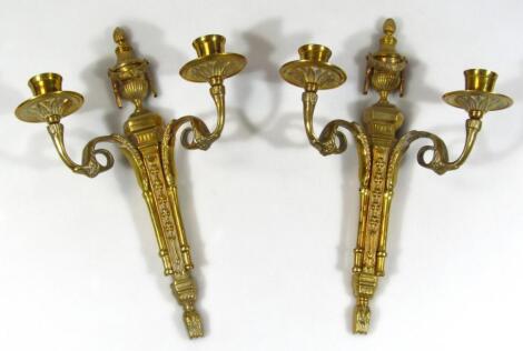 A pair of classical design brass wall sconces