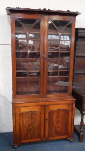 A Victorian mahogany cupboard bookcase