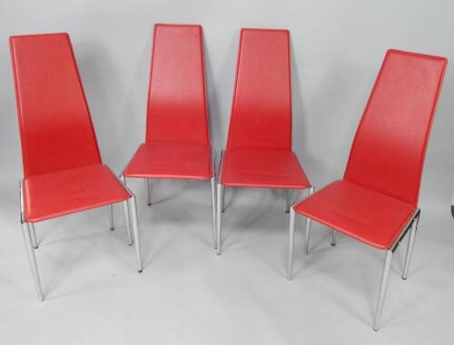 A set of four aluminium and red leatherette single dining chairs