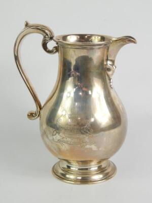 A silver jug for Norman of London