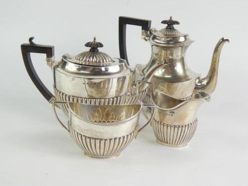 A composite silver four piece tea and coffee set