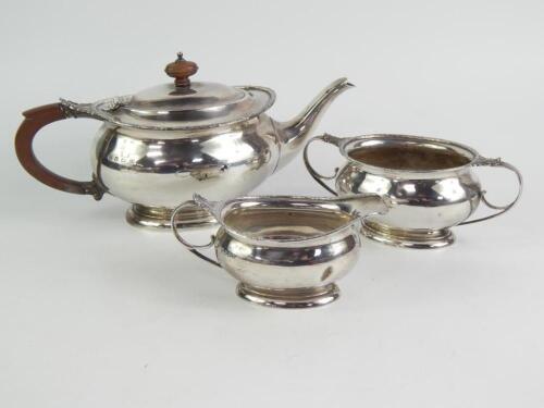 A George V silver three piece tea set