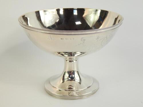 A silver pedestal fruit bowl