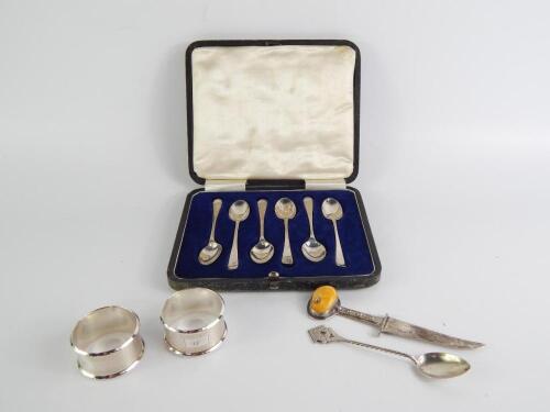 A set of six George V silver coffee spoons