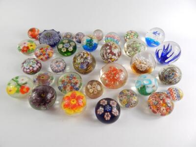 Millefiori floral and abstract glass paperweights