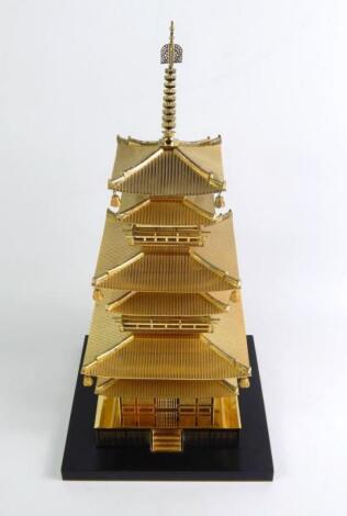 A Chinese brass model of a six storey pagoda