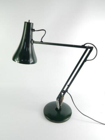 A green painted anglepoise lamp