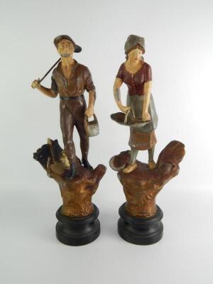 A pair of Continental cast metal early 20thC figures