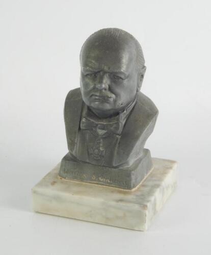 A cast metal bust of the Rt Hon Sir Winston Churchill