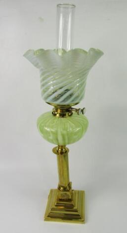 A Victorian brass oil lamp