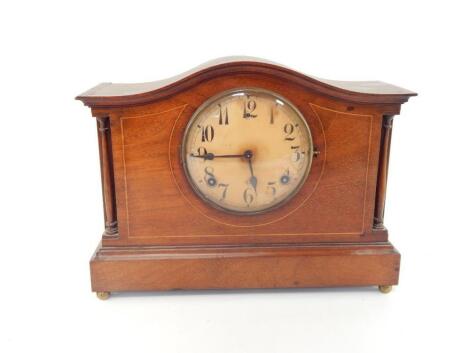 An Edwardian mahogany and boxwood line inlaid mantel clock