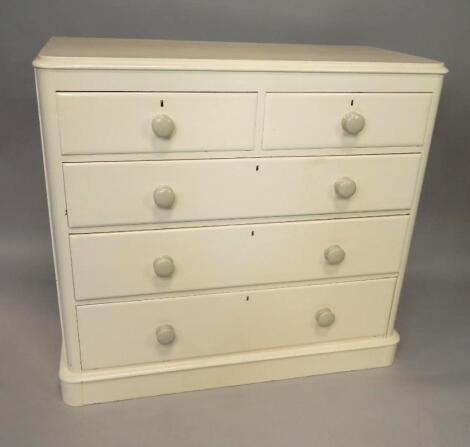 A white painted Victorian pine chest of drawers