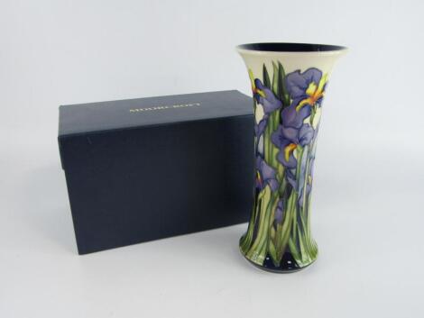 A Moorcroft pottery vase decorated in the Irises pattern