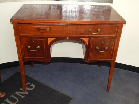 A George III mahogany boxwood line and paterae inlaid serving table