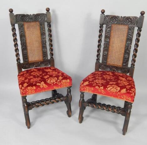 A pair of Victorian oak Carolean style single dining chairs