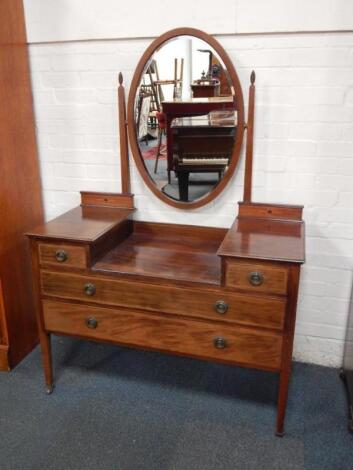 An Edwardian mahogany dressing chest