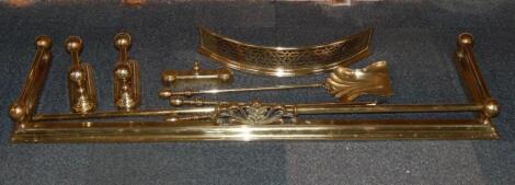 A Victorian brass fender