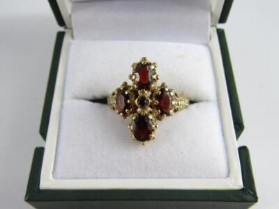 A 9ct gold and garnet five stone ring - 2