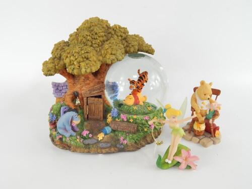 A Disney Store Exclusive Winnie The Pooh musical snow globe