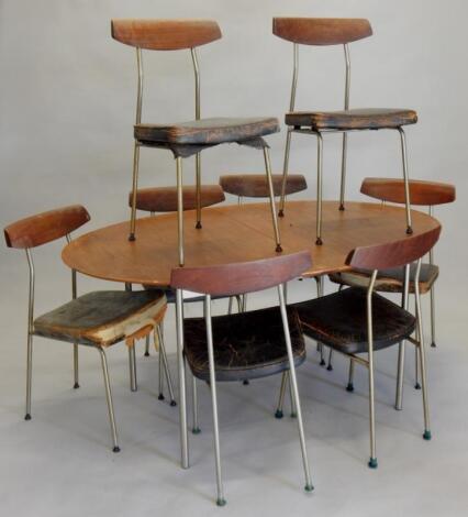 A 1960's Stag teak dining room suite designed by John and Sylvia Reid