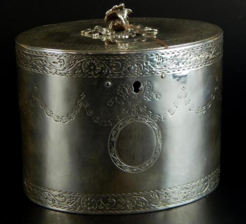 A George III oval silver tea caddy