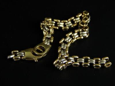 A bi-colour 9ct gold bracelet (AF)