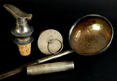 A collection of small silver and white metal