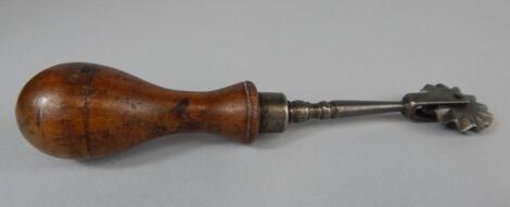 A Victorian steel pastry or pie jigger