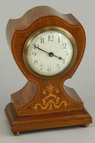 An Edwardian mahogany and marquetry mantel timepiece