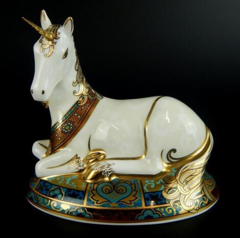 A Royal Crown Derby unicorn paperweight