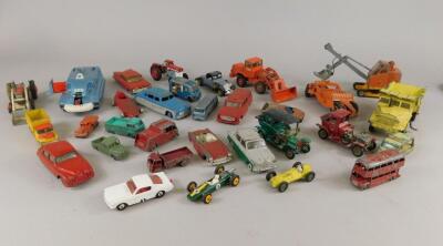 A collection of playworn die-cast vehicles
