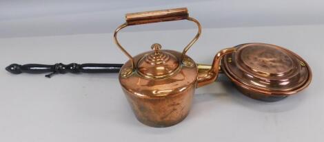 A 19thC copper and brass warming pan