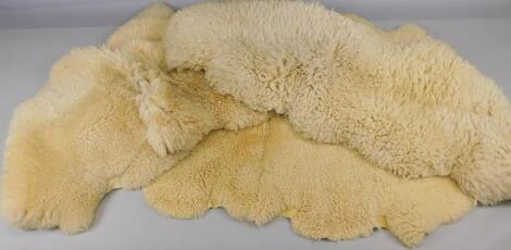 Three sheepskin rugs