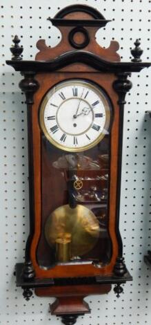 A small Vienna walnut and ebonised wall timepiece