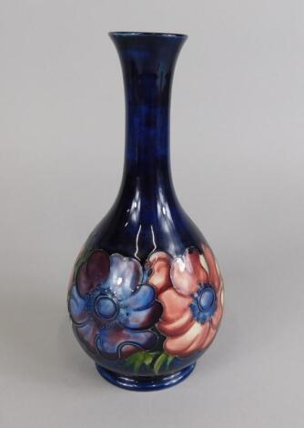 A William Moorcroft bottle shaped vase