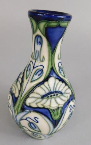 A modern Moorcroft Rain Daisy bottled shaped vase