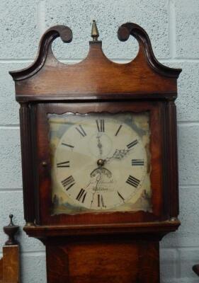 A 19thC oak and mahogany longcase clock