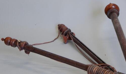 Three mahogany Victorian style curtain poles