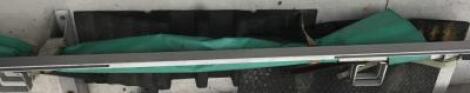 A lightweight plastic rescue green stretcher