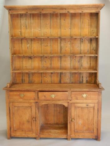 A 19thC stripped pine dresser